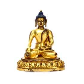 A GILT BRONZE FIGURE OF BUDDA