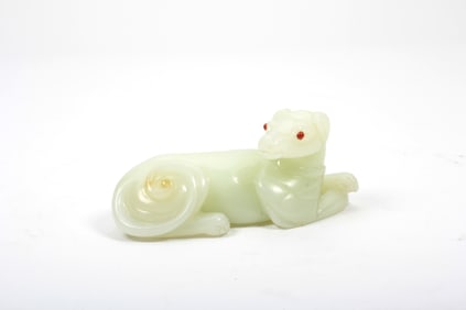 A JADE DOG CARVING