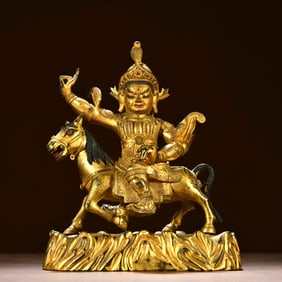 A GILT BRONZE FIGURE OF IRSYAYAMARI