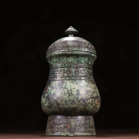 A BRONZE VESSEL, ZHI