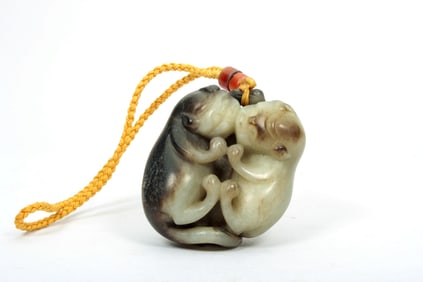 A JADE DOUBLE BADGER