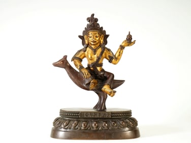 A PARTIALY GILT-LACQUERED FIGURE OF JI HU DI GA TIAN