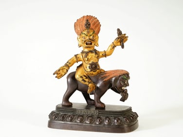 A PARTIALY GILT-LACQUERED FIGURE OF RAKSHA