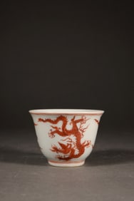 AN IRON RED DRAGON CUP