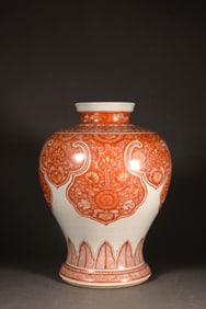 AN IRON RED PLUM VASE