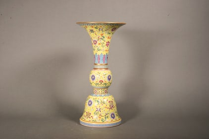 A YELLOW BASED FAMILLE ROSE 'LOTUS' HU