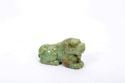 A JADEITE BEAST CARVING