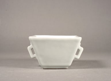 A CELADON GLAZED CUP