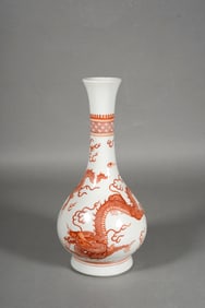 AN IRON RED 'DRAGON' VASE