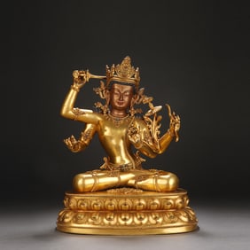 Gilt Bronze Four Armed GuanYin Figure