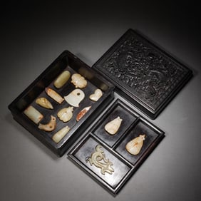 Group of Fourteen Jade Carved Dragon Shape Bi and Jade Stone