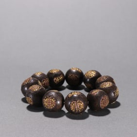 Agarwood Inlaid Gilt Silver Carved Shou Pattern Bead Bracelet