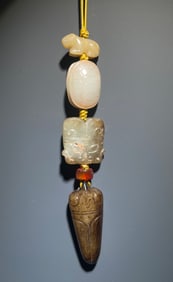 Group of Four Jade Carved Beast Face Pattern Ornament