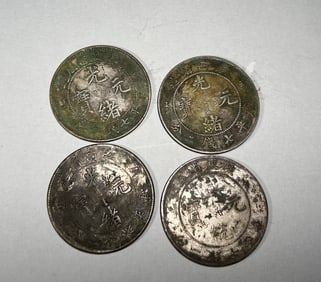 Group of Four Chinese Silver Coin