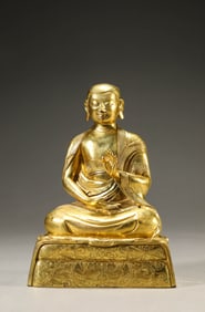 A Gilt-Bronze Guru Statue