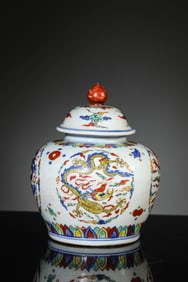 A Porcelain Wucai Dragon Jar and Cover