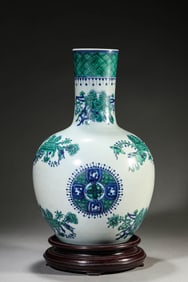 A Porcelain Eight Treasure Vase
