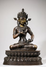 A Tibetan Copper and Silver-Inlaid Vajrasattva Statue