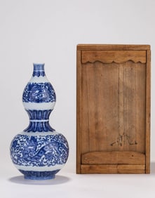 A Porcelain Blue and White Interlock Branches Double-Gourd Vase