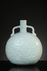 A Porcelain Celadon-Glazed Dragong Vase