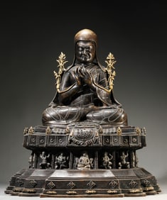 A Tibetan Saka Style Cooper and Silver Inlaid Sakyapa Order Karmapa Statue