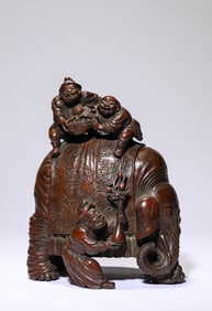 A Bamboo Foreigner and Elephant Carving