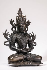 A Tibetan Pala Dynasty Copper and Silver Inlaid Amitayus Statue