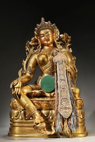 A 17th Century Gilt-Bronze Green Tara Statue