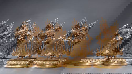 Group of Eight Gilt Bronze GuanYin Figure