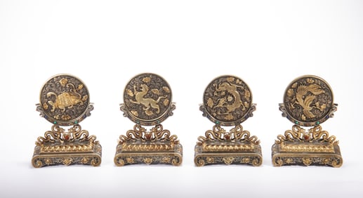 Group of Four Gilt Bronze Carved Beast Pattern Table Plaque