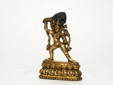 A GILT BRONZE FIGURE OF BUDDA