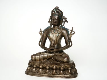 A BRONZE FIGURE OF TARA