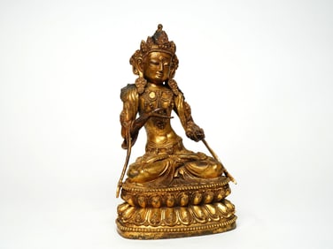 A GILT BRONZE FIGURE OF BUDDA