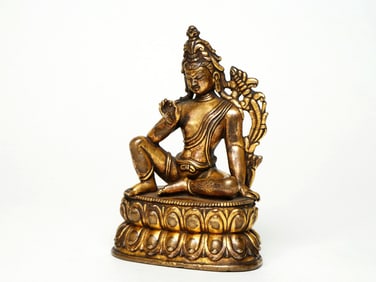 A GILT BRONZE FIGURE OF SEATED BUDDA