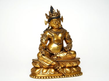 A GILT BRONZE FIGURE OF BUDDA