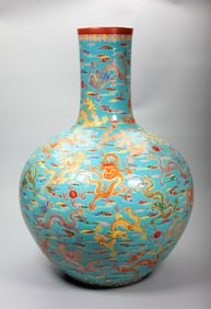 A FAMILLE ROSE 'DRAGON' BOTTLE VASE