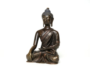 A BRONZE FIGURE OF BUDDA