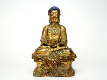 A GILT BRONZE FIGURE OF BUDDA