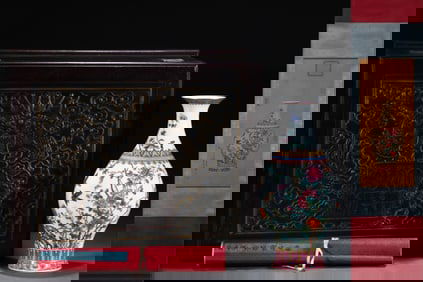 A QING YONGZHENG PERIOD FAMILLE ROSE 'BIRD AND FLORAL'GUANYIN VASE