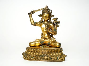 A GILT BRONZE FIGURE OF MANJUSHRI