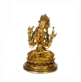 A GILT BRONZE FIGURE OF BUDDA
