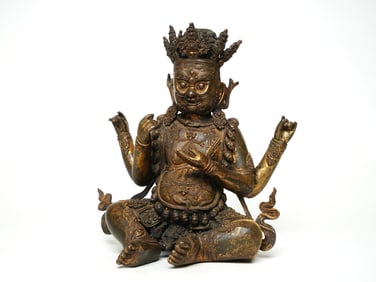 A BRONZE FIGURE OF TARA