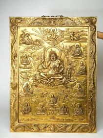 A GILT BRONZE FIGURE OF BUDDA PLATE