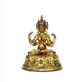 A GILT BRONZE FIGURE OF GUANYIN