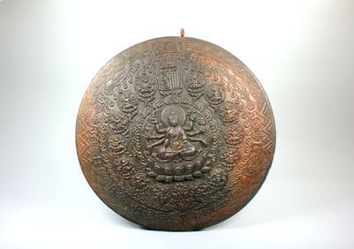A BRONZE ORNAMENT