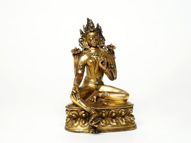 A GILT BRONZE FIGURE OF TARA