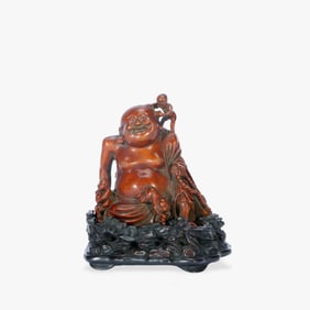 A BOX WOOD CARVED LUOHAN