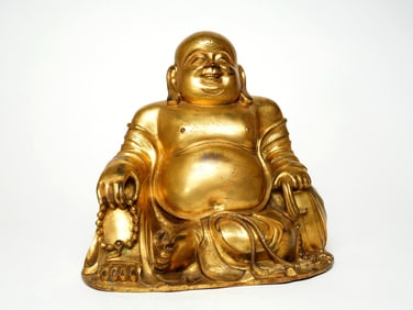 A GILT BRONZE FIGURE OF MAITREYA-BUDDHA