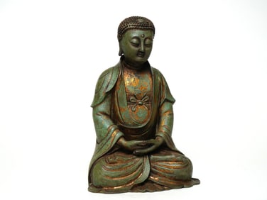 A BRONZE FIGURE OF TARA