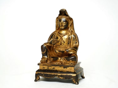 A GILT BRONZE FIGURE OF BUDDA